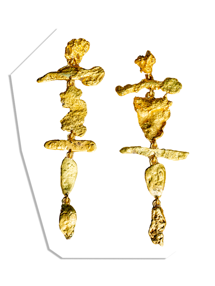 L’image contient peut-être : Trésor, Accessoires, Boucle d'oreille, Bijoux, Or, Croix, Symbole, Personne et Tête