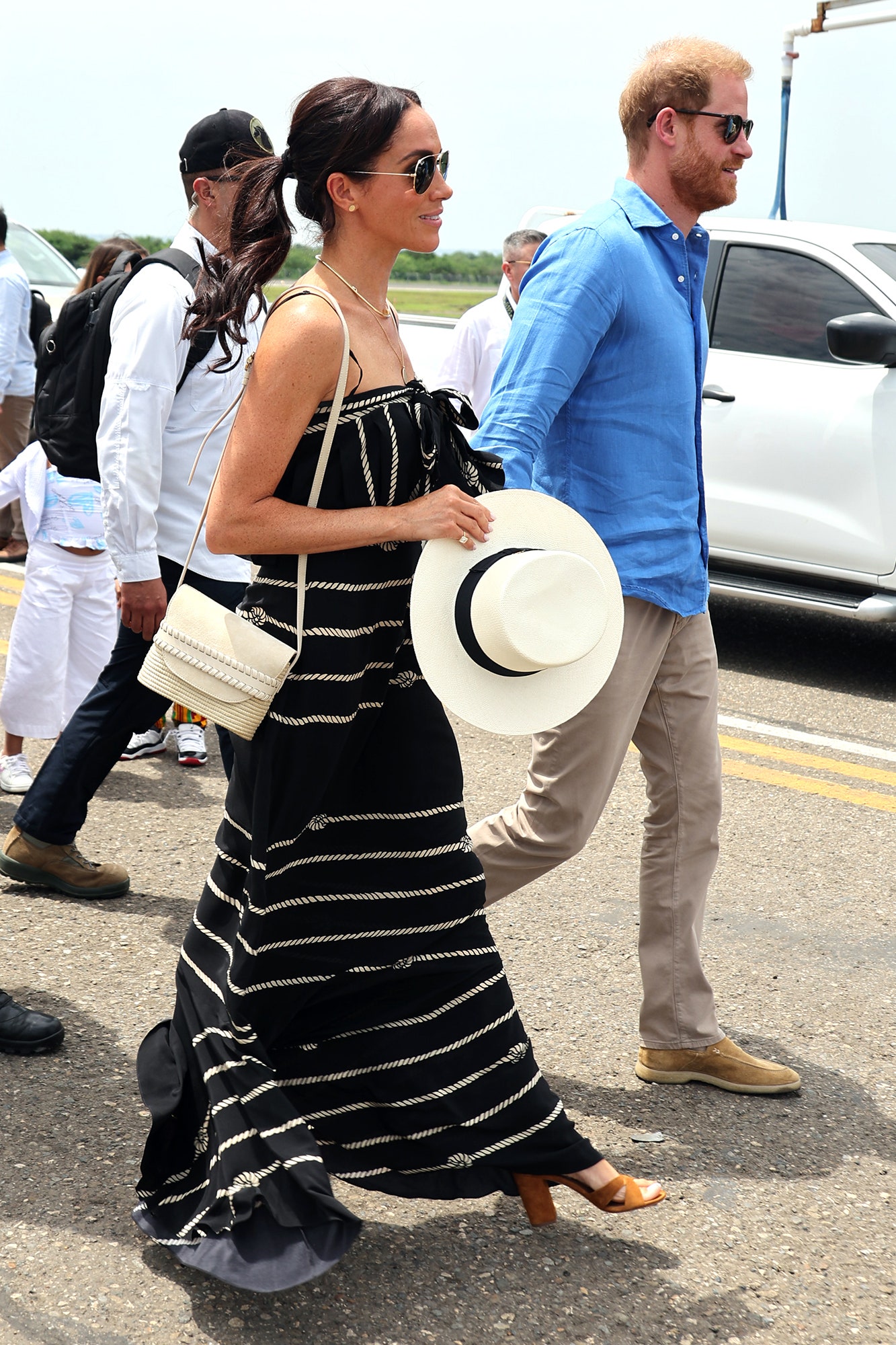L'image peut contenir Meghan, duchesse de Sussex, prince Harry, duc de Sussex, Eugene Sims, vêtements, chaussures et chaussures.