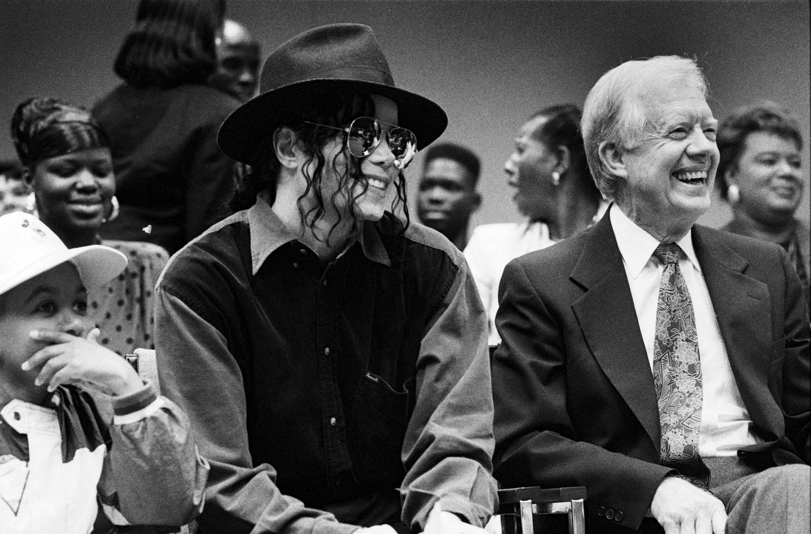 Jimmy Carter, notre président de la culture pop L'image peut contenir Michael Jackson Jimmy Carter Emmanuel Lewis Vêtements Chapeau Accessoires Tenue de soirée Cravate et tête