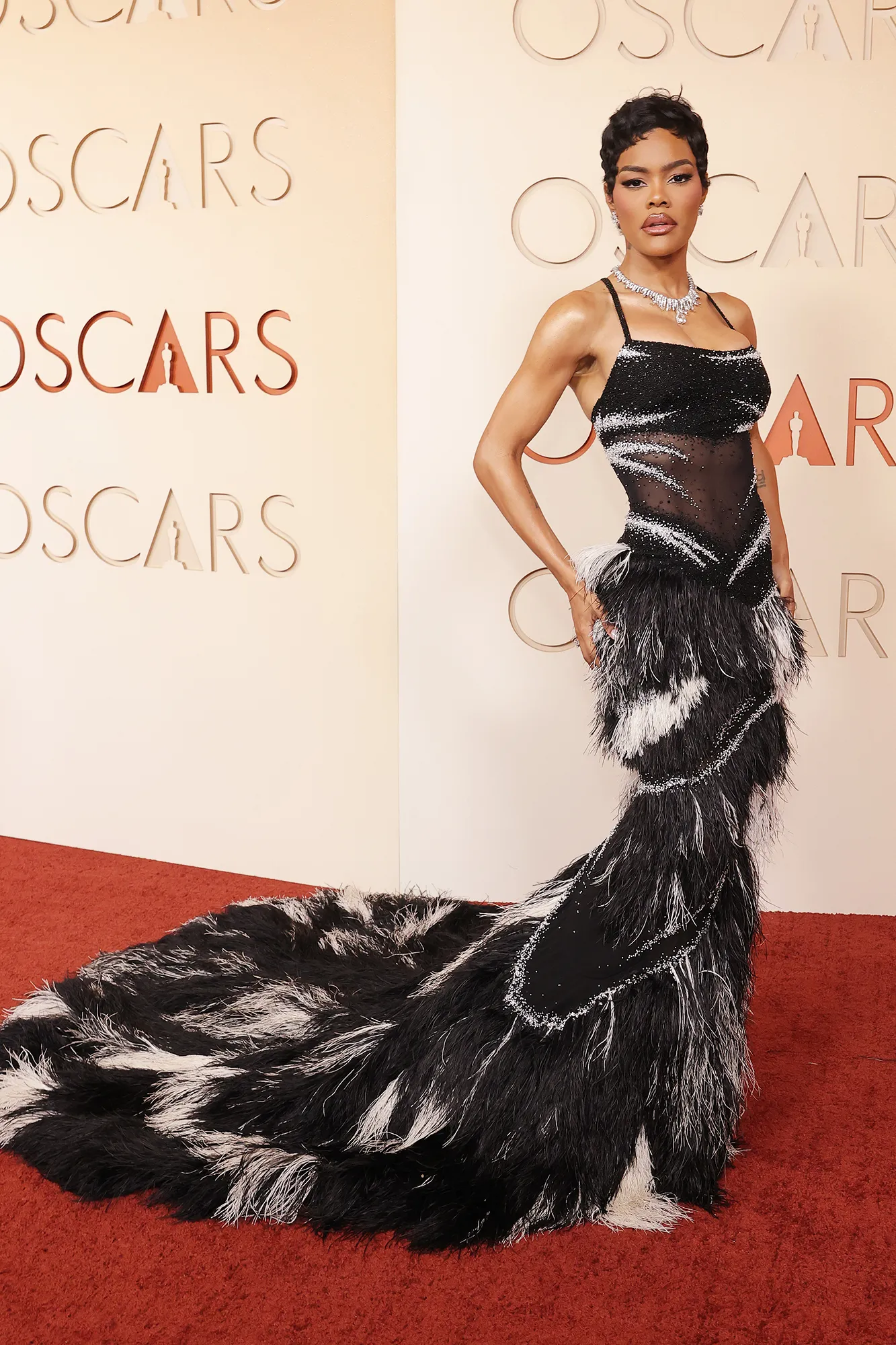 Bijoux, sacs, ongles… et crocs aux Oscars 2026 L'image peut contenir Teyana Taylor Mode Vêtements Robe Tenue de soirée Première Tapis Rouge Personne adulte et robe