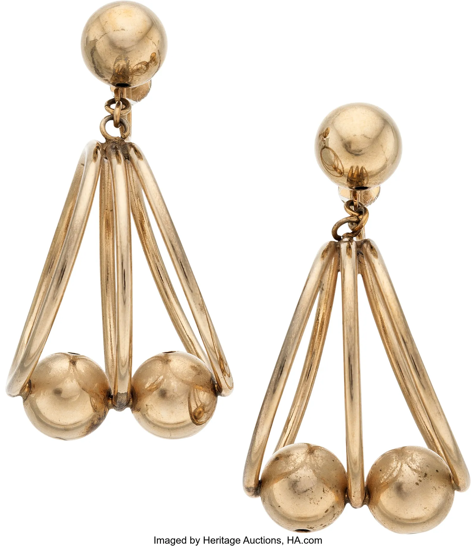 L'image peut contenir des accessoires, des boucles d'oreilles et des bijoux
