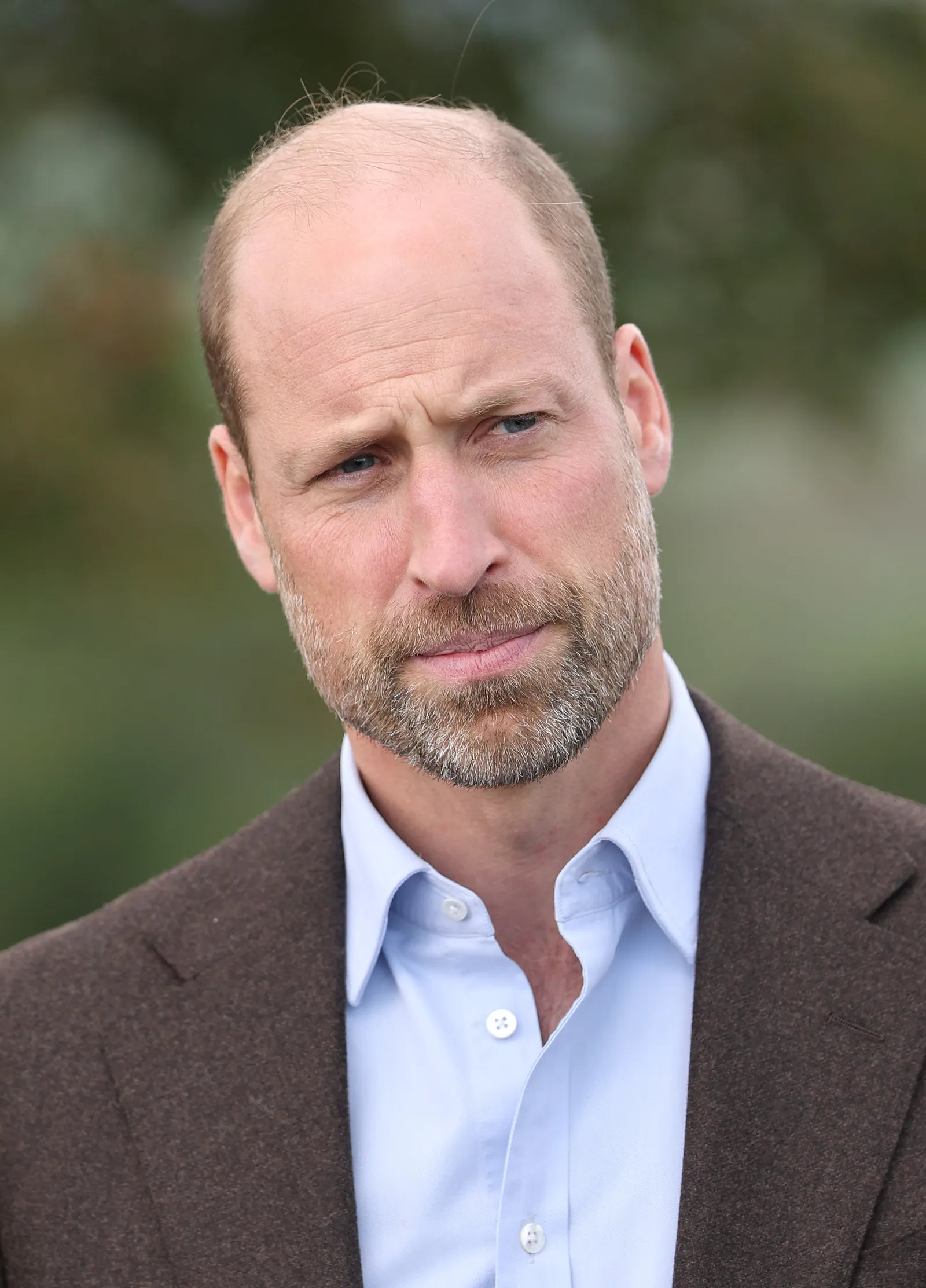 L'image contient peut-être le prince William, duc de Cambridge, barbe, visage, tête, personne, photographie, portrait, blonde et cheveux.