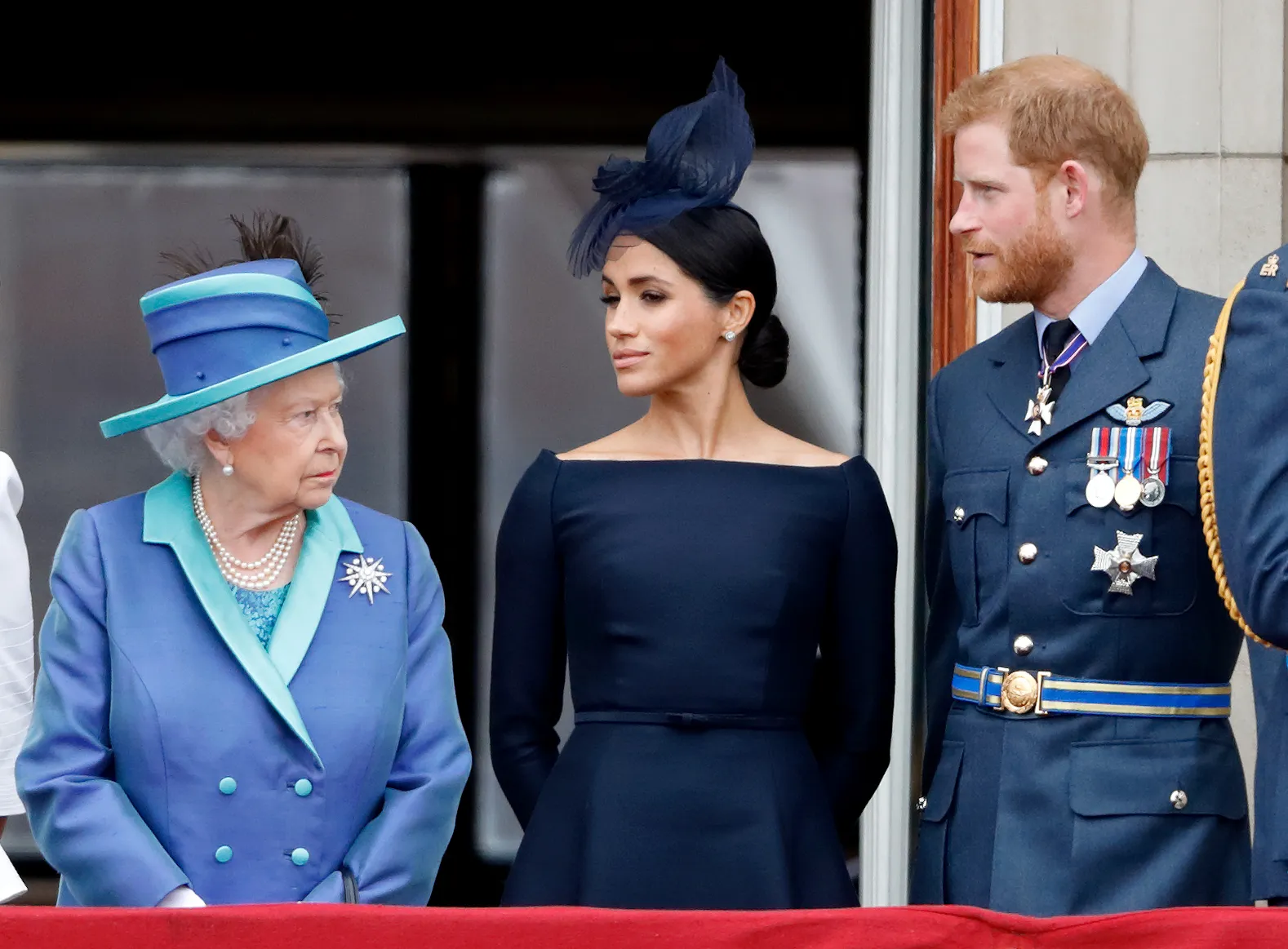 L'image peut contenir Meghan, duchesse de Sussex, Elizabeth II, personne, cheveux adultes, visage et tête