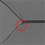 Snapshot of the Material Deformations Formed by a Single Rapidly Propagating Crack Moving Left to Right