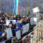 cc Mahammad Turkman, modified, https://commons.wikimedia.org/wiki/File:Environmental_action_on_Lachin_-_Khankendi_road_6.jpg