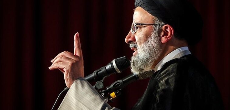 cc Hamed Malekpour, modified, https://commons.wikimedia.org/wiki/File:Ebrahim_Raisi_presidential_campaign_rally_in_Tehran,_29_April_2017_02.jpg