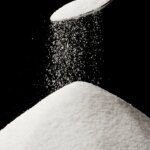 Sprinkling Sugar From Spoon