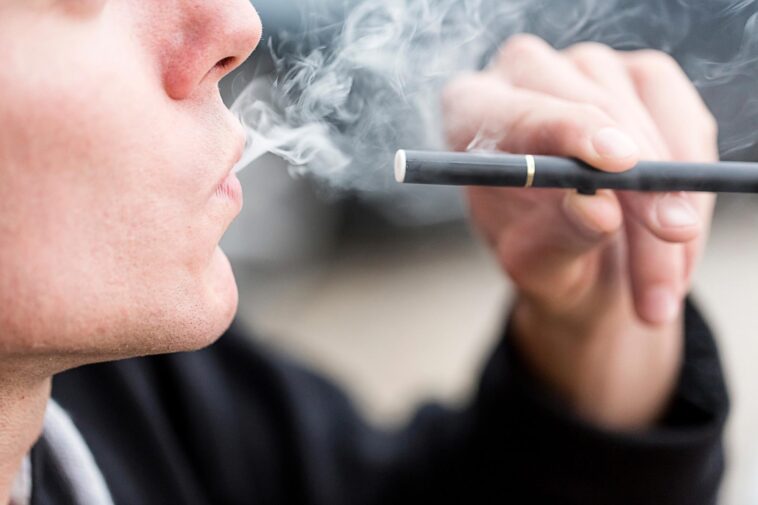 Smoking E-Cigarette