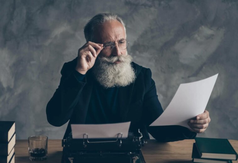 Professor Examining Paper