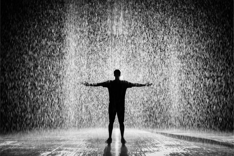 Silhouette Man Standing Under Rain