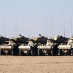 Le coup d’État au Niger marque un retour à la géopolitique de la guerre froide en Afrique Light armored vehicles in Niger; modified, https://commons.wikimedia.org/wiki/File:Niger_Panhard_AML.JPG