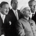 cc Unknown author, modified, https://commons.wikimedia.org/w/index.php?limit=500&offset=0&profile=default&search=nehru&title=Special:Search&ns0=1&ns6=1&ns12=1&ns14=1&ns100=1&ns106=1#/media/File:Hermann_Josef_Abs_-_mit_Adenauer_und_Nehru_1956.jpg