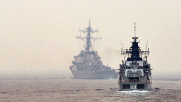 cc COMSEVENTHFLT, modified, https://flickr.com/photos/us7thfleet/9096977240/in/photolist-eRSopb-hJWAVh-AeRMj5-2fvf26R-vmM3Ek-p7oW6V-hJWwCj-GhH3iz-nJnmD1-eXHVnH-GhGYfz-G9xQp7-G9xPRd-eVu217-eRQzAL-Gfq8cQ-FnfZmb-GmJpKc-eaGYXF-GbRN6F-pBiJ3F-fggUVH-fggQon-fgvZvs-XYYh63-psHkz8-G9xTEW-o1RJJi-fgw2M1-25x7M71-hEpuMR-bzEEX9-2kSbheJ-grbmTr-cC9BZN-bNziA4-w753Ar-hEnLGo-YEsiWo-2mHRB5A-pB3Rhk-RJPQMZ-2kSaK7a-ffPHsr-dkpkNK-ffPGSK-oB4Avs-bNzkQT-cCUT1j-2kSaK4Q, SOUTH CHINA SEA (June 19, 2013) The Malaysian frigate KD Jabat trails USS Curtis Wilbur in the South China Sea as they form up for a photo exercise with other U.S. and Malaysian ships. Freedom is in Malaysia participating in Cooperation Afloat Readiness and Training (CARAT) 2013. CARAT is a series of bilateral military exercises between the U.S. Navy and the armed forces of Bangladesh, Brunei, Cambodia, Indonesia, Malaysia, the Philippines, Singapore, Thailand and Timore Leste. Additional ships participating in CARAT include the guided missile destroyer USS Curtis Wilbur (DDG 54) with embarked Destroyer Squadron 7 staff, the dock landing ship USS Tortuga (LSD 46) with embarked USMC Landing Force, and the diving and salvage ship USNS Safeguard (T-ARS 50). (U.S. Navy photo by Mass Communication Specialist 1st Class Cassandra Thompson)