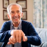 Happy Senior Man With Cane