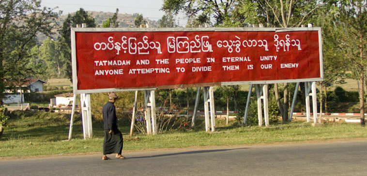 cc juls78, modified, https://commons.wikimedia.org/w/index.php?sort=last_edit_desc&search=Tatmadaw+filetype%3Abitmap&title=Special:Search&profile=advanced&fulltext=1&advancedSearch-current=%7B%22fields%22%3A%7B%22filetype%22%3A%22bitmap%22%7D%7D&ns0=1&ns6=1&ns12=1&ns14=1&ns100=1&ns106=1#/media/File:Propaganda,_Myanmar_2.jpg