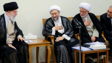 Ali Khamenei with Sadeq Larijani in June 2018; cc Khamenei.ir, modified, https://commons.wikimedia.org/w/index.php?search=iran%20supreme%20leader&ns0=1&ns6=1&ns12=1&ns14=1&ns100=1&ns106=1#/media/File:Ali_Khamenei_with_Sadeq_Larijani_in_June_2018.jpg