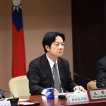 DPP Presidential Candidate William Lai; cc executive yuan, https://commons.wikimedia.org/w/index.php?search=William%20Lai%20%20taiwan&ns0=1&ns6=1&ns12=1&ns14=1&ns100=1&ns106=1#/media/File:William_Lai_and_Shen_Jong-chin_20170919.jpg, modified