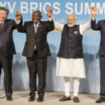 cc 15th Brics summit - https://commons.wikimedia.org/w/index.php?search=brics%20south%20africa%20summit&ns0=1&ns6=1&ns12=1&ns14=1&ns100=1&ns106=1#/media/File:XV_BRICS_Summit_family_photo.jpg, modified