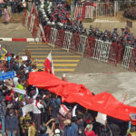 cc VOA Burma, public domain, https://commons.wikimedia.org/wiki/File:Protesters_against_the_military_coup.jpg, modified,