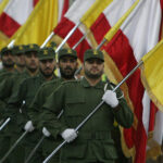 Escalade entre Israël et le Hezbollah : scénarios possibles Hezbollah fighters in a ceremony; https://commons.wikimedia.org/wiki/File:Hezzzzbollah.jpgcc khamenei.ir, modified