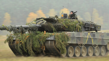 cc U.S. Army Europe photo by Visual Information Specialist Markus Rauchenberger, modified, A German Army Leopard II tank, assigned to 104th Panzer Battalion, moves through the Joint Multinational Readiness Center during Saber Junction 2012 in Hohenfels, Germany, Oct. 25. The U.S. Army Europe
