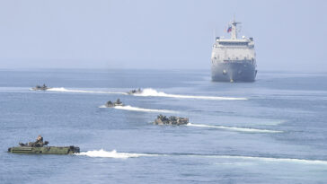 cc Official U.S. Navy Page, modified, https://flickr.com/photos/usnavy/48913362328/in/photolist-2hwiLvf-9NRyjH-2igkrKx-2kgvR2E-2iivSk5-7PK4bp-2m9FfsW-2oMBusZ-2j1rkup-2mr24jU-V4FDqV-qRa5LU-SWocm5-XhGmaz-FZKW5k-2gF7M3x-7yAEMX-2ezo3UQ-XQsVxG-2jU3QGH-2mv3mJT-RnjwHs-fpm5Ms-2ieFXM2-2fFD3Jf-JXWFCi-2o5LdHb-ZtFHrg-2nwwQge-CnqUzq-FHBxFC-2aqwma4-2nSMDWe-HqUeBD-2jKwg6C-2jejSsn-W4eyoH-pP1oCJ-2jtR7Dr-2h9S8E2-LfCYx3-2in8a2p-2kzUhH7-2jbcgKJ-297ZMA3-Fy3aRq-2jrnQrr-2jr8yz8-SF77sh-2mrRuqT