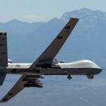 An MQ- Reaper remotely piloted aircraft performs aerial maneuvers over Creech Air Force Base, Nev., June 25, 2015. The MQ-9 Reaper is an armed, multi-mission, medium-altitude, long-endurance remotely piloted aircraft that is employed primarily as an intelligence-collection asset and secondarily against dynamic execution targets. (U.S. Air Force photo by Senior Airman Cory D. Payne/Not Reviewed)