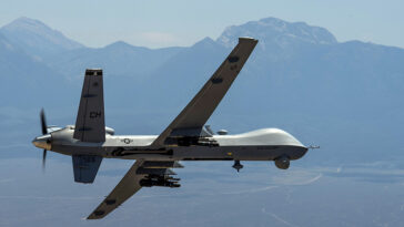 An MQ- Reaper remotely piloted aircraft performs aerial maneuvers over Creech Air Force Base, Nev., June 25, 2015. The MQ-9 Reaper is an armed, multi-mission, medium-altitude, long-endurance remotely piloted aircraft that is employed primarily as an intelligence-collection asset and secondarily against dynamic execution targets. (U.S. Air Force photo by Senior Airman Cory D. Payne/Not Reviewed)