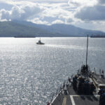 170623-N-ZW825-577 SUBIC BAY, Republic of Philippines (June 23, 2017) Arleigh Burke-class guided-missile destroyer USS Sterett (DDG 104) departs Subic Bay, Republic of Philippines at the conclusion of a scheduled port visit. Sterett is part of the Sterett-Dewey Surface Action Group and is the third deploying group operating under the command and control construct called 3rd Fleet Forward. U.S. 3rd Fleet operating forward offers additional options to the Pacific Fleet commander by leveraging the capabilities of 3rd and 7th Fleets. (U.S. Navy photo by Mass Communication Specialist 1st Class Byron C. Linder/Released) - cc Flickr Naval Surface Warriors, modified - https://creativecommons.org/licenses/by-sa/2.0/