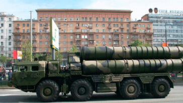 An S-300 anti-aircraft system missile launcher in a Russian military parade. , modified, cc SLonoed, https://commons.wikimedia.org/wiki/File:Side_view_of_a_S-300_launcher.JPG