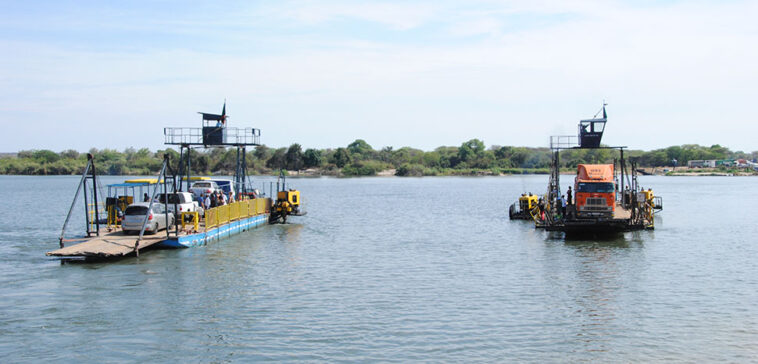 Border crossing (ferry) from Botswana to Zambia, cc diego_cue, modified, https://commons.wikimedia.org/wiki/File:Border_crossing_%28ferry%29_from_Botswana_to_Zambia_-_panoramio.jpg