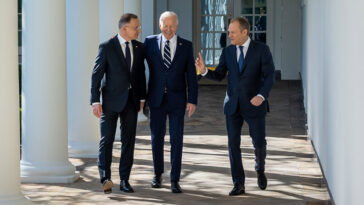 President Joe Biden walks along the West Colonnade of the White House with President Andrzej Duda and Prime Minister Donald Tusk of Poland, Tuesday, March 12, 2024., cc White House, modified, https://commons.wikimedia.org/w/index.php?search=biden%20poland&ns0=1&ns6=1&ns12=1&ns14=1&ns100=1&ns106=1#/media/File:President_Joe_Biden_walks_along_the_West_Colonnade_of_the_White_House_with_President_Andrzej_Duda_and_Prime_Minister_Donald_Tusk_of_Poland,_Tuesday,_March_12,_2024.jpg