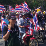 cc ilf_, modified, wikicommons. Anti-government protesters in Bangkok, on motorcycles while mobilizing to surround government offices, 1 December 2013 - the crisis that resulted in the removal of Yingluck Shinawatra.
