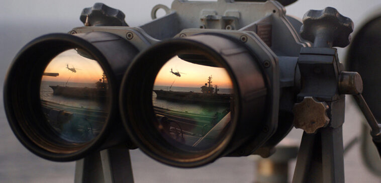 cc U.S. Navy photo by Airman Ricardo J. Reyes ; 051104-N-2984R-004 Onboard USS Harry S. Truman The sun sets over a set of
