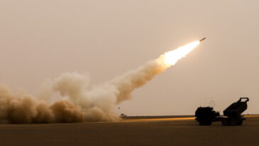 U.S. Army Soldiers assigned to Alpha Battery, 1st Battalion, 77th Field Artillery Regiment, 41st Field Artillery Brigade, fire the High Mobility Artillery Rocket System during African Lion 2021, at Guirer Libouihi Air Base, on June 9, 2021. The... (Spc. Zachary Stahlberg)