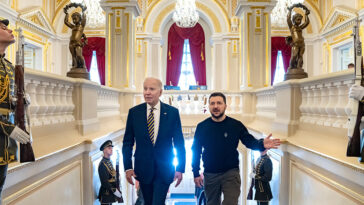 cc White House, modified, https://commons.wikimedia.org/w/index.php?search=zelensky%20biden&ns0=1&ns6=1&ns12=1&ns14=1&ns100=1&ns106=1#/media/File:P20230220AS-0567_(52734317347).jpg  President Joe Biden meets with Ukrainian President Volodymyr Zelenskyy at Mariinsky Palace, Monday, February 20, 2023, during an unannounced trip to Kyiv, Ukraine. (Official White House Photo by Adam Schultz)