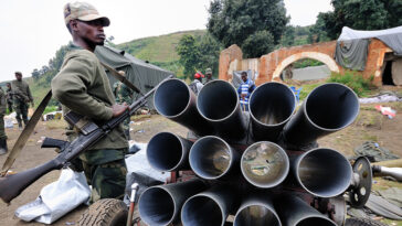 M23 Rebels in 2012; cc Al Jazeera, modified, https://www.flickr.com/photos/aljazeeraenglish/7580534258