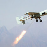 A drone test in Iran; cc Saeed Sajjadi, modified, https://fi.wikipedia.org/wiki/Tiedosto:Iranian_drone_exercise_in_2022_-_Day_2_%2820%29.jpg