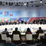 cc The Presidential Press and Information Office of Azerbaijan, modified, https://en.m.wikipedia.org/wiki/File:2024_BRICS_Summit_%281729759568%29.jpg