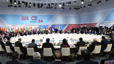cc The Presidential Press and Information Office of Azerbaijan, modified, https://en.m.wikipedia.org/wiki/File:2024_BRICS_Summit_%281729759568%29.jpg