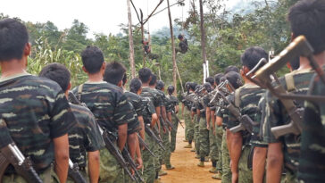 Footage of Arakan Army recruits training in 2024; cc VOA, modified, https://commons.wikimedia.org/w/index.php?search=arakan%20army&ns0=1&ns6=1&ns12=1&ns14=1&ns100=1&ns106=1#/media/File:Arakan_Army_Training.jpg