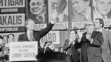 public domain, Library of Congress, modified, https://commons.wikimedia.org/w/index.php?search=jimmy%20carter%20election&ns0=1&ns6=1&ns12=1&ns14=1&ns100=1&ns106=1#/media/File:Jimmy_Carter_and_Mayor_Richard_J._Daley_at_the_Illinois_State_Democratic_Convention_in_Chicago,_Illinois.jpg / Thomas J. O