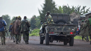 M23 fighters loyal to Bosco Ntaganda move along the road towards Goma as Peacekeepers observed gathering of armed people North of the city, the 1st of March 2013. cc MONUSCO Photos /Sylvain Liechti / modified, https://www.flickr.com/photos/monusco/8531078326