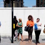 People waiting at traffic lights Description People waiting at traffic lights. Lewisham, London, England, UK