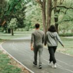 Beautiful sport couple walking on the path in the park; Shutterstock ID 2189172403; purchase_order: -; job: -; client: -; other: -