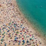 Aerial view of a crowded beach from above, praia de Nazar?, Portugal, Europe; Shutterstock ID 2189816843; purchase_order: -; job: -; client: -; other: -