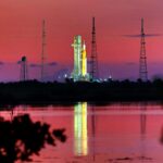 2SWKMCK Artemis I sits at Launch Pad 39-B at Kennedy Space Center, Fla., at sunrise, Wednesday, Aug. 31, 2022, as seen from nearby Canaveral National Seashore. (Joe Burbank/Orlando Sentinel/TNS)