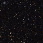 Les halos de matière noire tournant lentement peuvent expliquer mystérieux `` petits points rouges '' dans l'univers précoce Les halos de matière noire tournant lentement peuvent expliquer mystérieux `` petits points rouges '' dans l'univers précoce