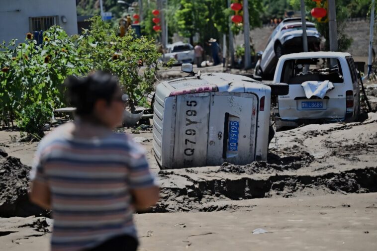 Pékin émet un nouvel avertissement de tempête après des inondations mortelles