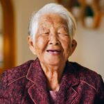 portrait happy senior asian woman look at camera